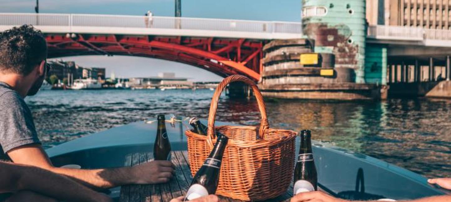 Have a picnic while cruising around in Copenhagen's harbour