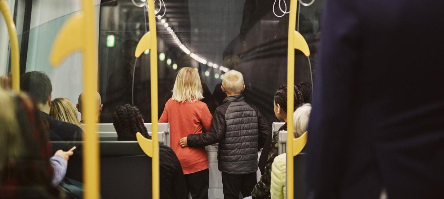 Two boys riding the Metro in Copenhagen