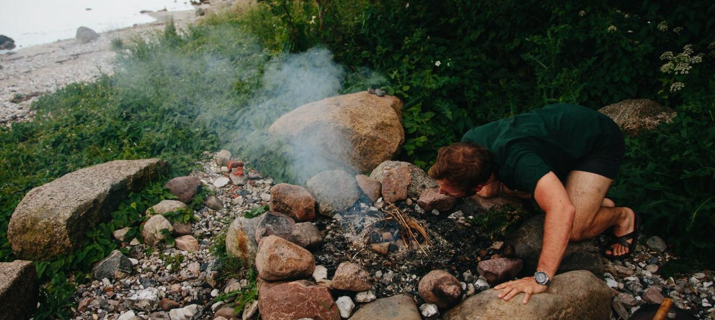 A man trying to start a bonfire - Nederste Skovbymark