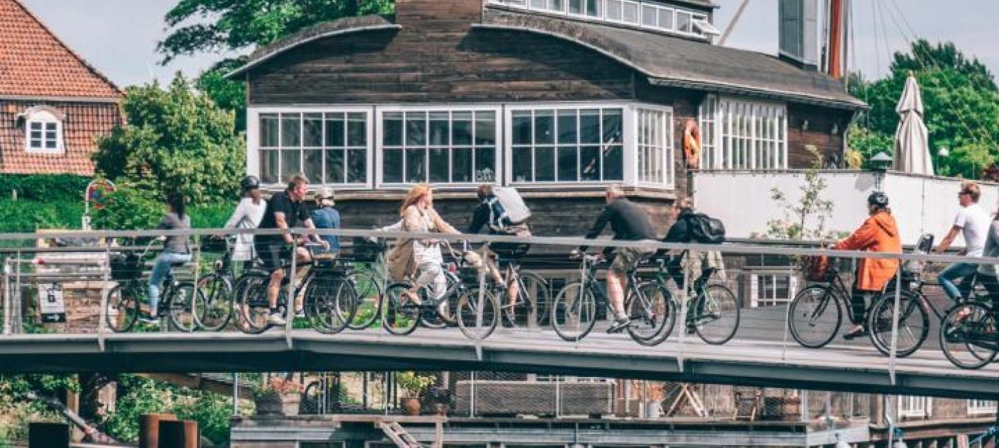 Cyclists crossing a bridge in Copenhagen