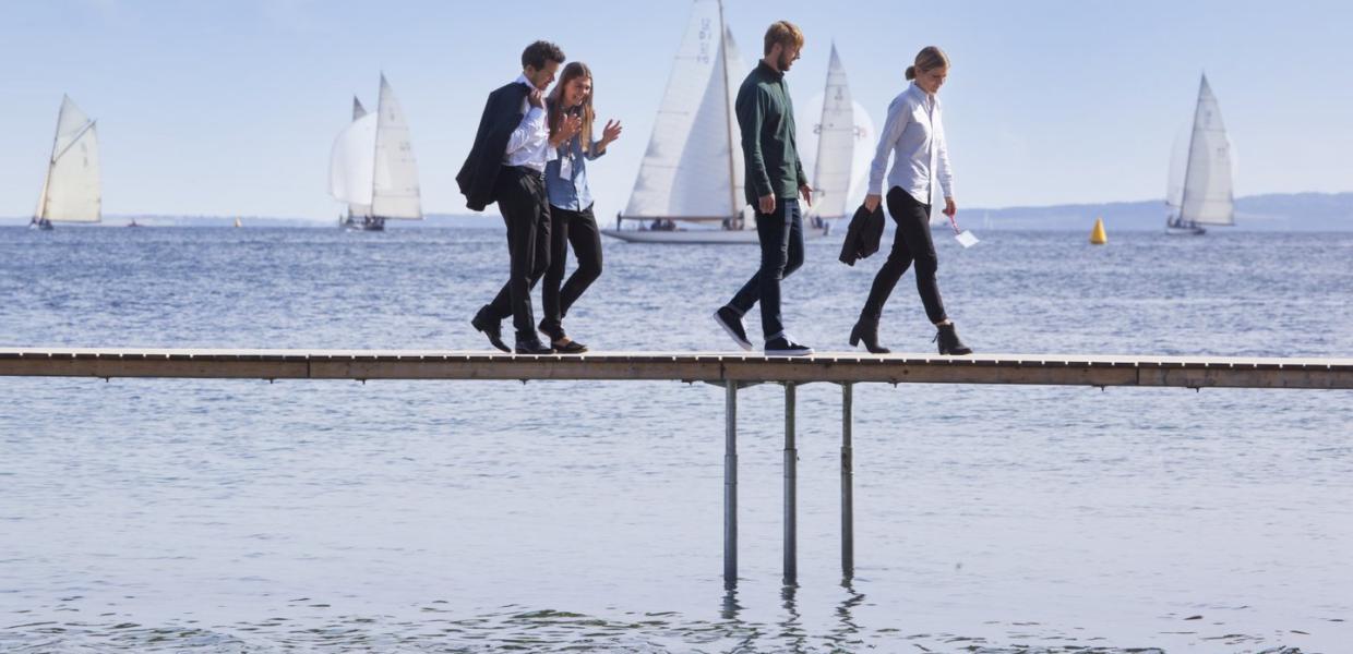 Business people walking on Aarhus infinite bridge